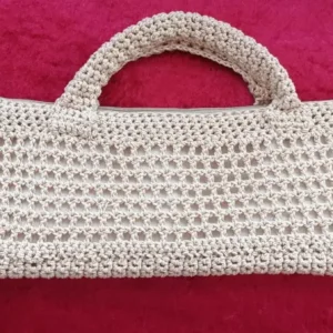 Bolso de ganchillo forrado de color beige de la marca de moda Tierra de Tartessos